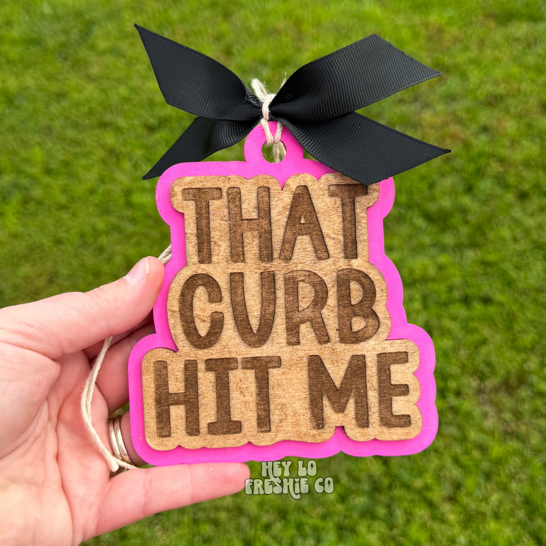That Curb Hit Me Car Charm